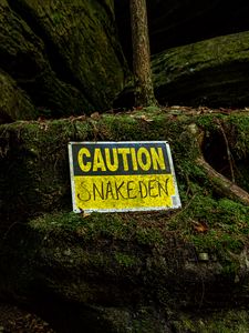 Preview wallpaper sign, warning, words, stone, moss