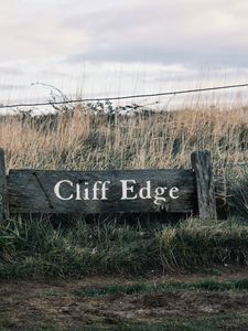 Preview wallpaper signboard, inscription, field, grass