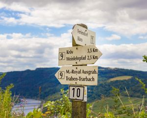 Preview wallpaper signs, germany, pole, directions, mountains