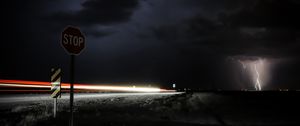 Preview wallpaper signs, road, night, dark, thunderstorm