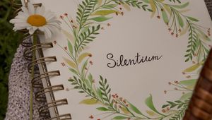 Preview wallpaper silentium, inscription, word, notepad, lettering