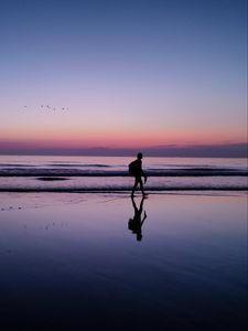 Preview wallpaper silhouette, alone, beach, dark