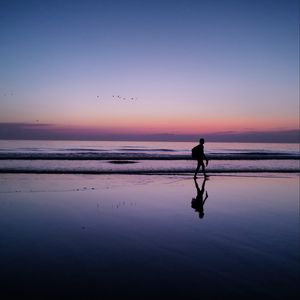 Preview wallpaper silhouette, alone, beach, dark