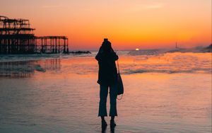 Preview wallpaper silhouette, alone, beach, sea, sunset, dark