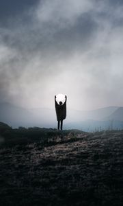 Preview wallpaper silhouette, alone, gesture, moon, mountains