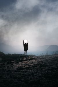 Preview wallpaper silhouette, alone, gesture, moon, mountains