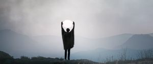 Preview wallpaper silhouette, alone, gesture, moon, mountains