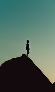 Preview wallpaper silhouette, alone, mountain, twilight, dark