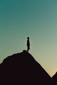 Preview wallpaper silhouette, alone, mountain, twilight, dark