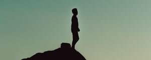 Preview wallpaper silhouette, alone, mountain, twilight, dark