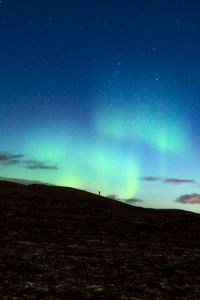 Preview wallpaper silhouette, alone, northern lights, night, dark