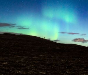 Preview wallpaper silhouette, alone, northern lights, night, dark