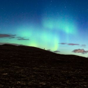 Preview wallpaper silhouette, alone, northern lights, night, dark