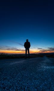 Preview wallpaper silhouette, alone, road, sunset, dark