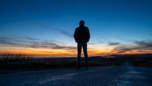 Preview wallpaper silhouette, alone, road, sunset, dark