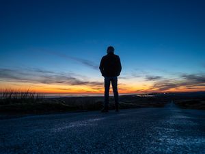 Preview wallpaper silhouette, alone, road, sunset, dark