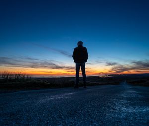 Preview wallpaper silhouette, alone, road, sunset, dark