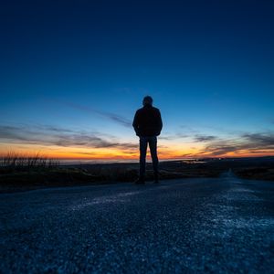 Preview wallpaper silhouette, alone, road, sunset, dark