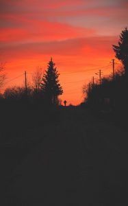 Preview wallpaper silhouette, alone, road, twilight, dark