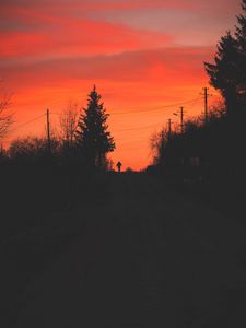 Preview wallpaper silhouette, alone, road, twilight, dark