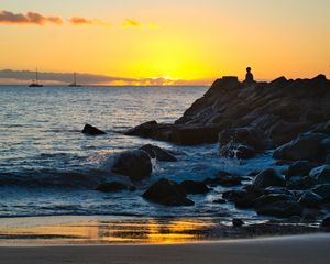 Preview wallpaper silhouette, alone, rocks, sea, horizon, sunset