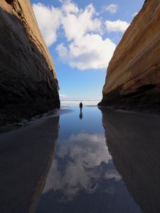 Preview wallpaper silhouette, alone, rocks, sea, landscape