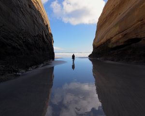 Preview wallpaper silhouette, alone, rocks, sea, landscape