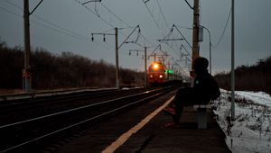 Preview wallpaper silhouette, alone, sad, train, station
