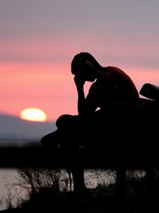 Preview wallpaper silhouette, alone, sad, dark, sunset