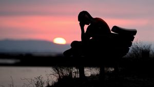 Preview wallpaper silhouette, alone, sad, dark, sunset