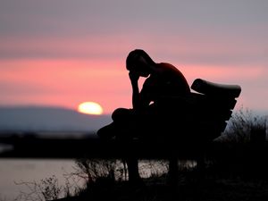 Preview wallpaper silhouette, alone, sad, dark, sunset