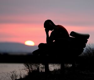 Preview wallpaper silhouette, alone, sad, dark, sunset