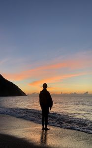 Preview wallpaper silhouette, alone, sea, beach, sunset, dark