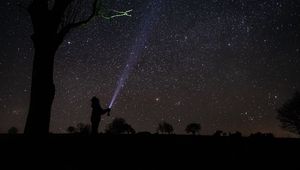 Preview wallpaper silhouette, alone, sky, stars, night, dark