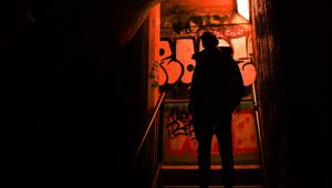 Preview wallpaper silhouette, alone, stairs, graffiti, dark