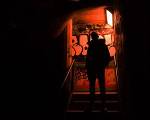 Preview wallpaper silhouette, alone, stairs, graffiti, dark