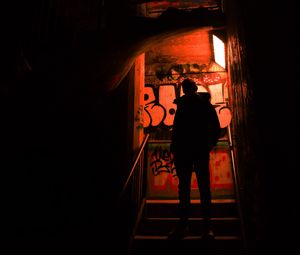Preview wallpaper silhouette, alone, stairs, graffiti, dark
