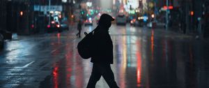 Preview wallpaper silhouette, alone, walk, city, street, road