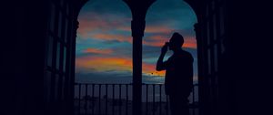 Preview wallpaper silhouette, arch, twilight, dark, man