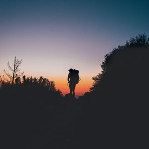 Preview wallpaper silhouette, backpack, tourist, hill