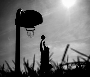 Preview wallpaper silhouette, ball, basketball hoop, basketball, black and white