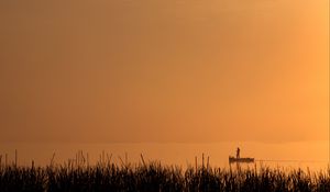 Preview wallpaper silhouette, boat, lake, lonely, fog