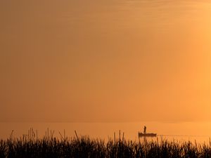 Preview wallpaper silhouette, boat, lake, lonely, fog