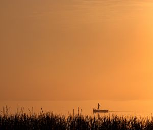 Preview wallpaper silhouette, boat, lake, lonely, fog