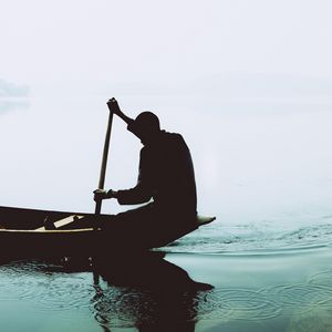 Preview wallpaper silhouette, boat, paddle, lonely, loneliness