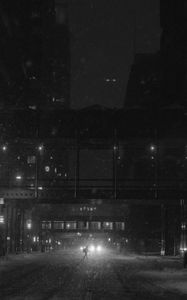 Preview wallpaper silhouette, bw, night, city, cloudy
