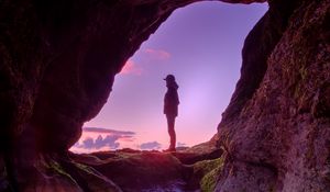 Preview wallpaper silhouette, cave, water, stones, reflection