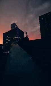 Preview wallpaper silhouette, city, buildings, sunset