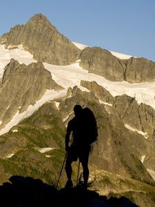 Preview wallpaper silhouette, climber, person, mountains, snow