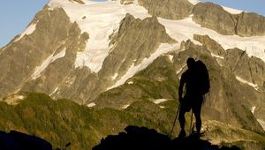 Preview wallpaper silhouette, climber, person, mountains, snow